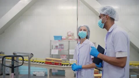 Inspection and Collaboration in the Food Processing Plant Stock Footage 334908502