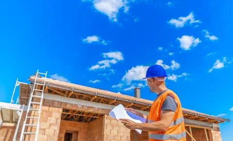Inspection of the construction project, manager on the construction of a family Foto stock