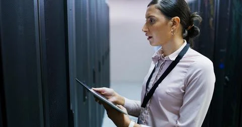 Inspection, mainframe and tech support with woman in server room for Foto stock