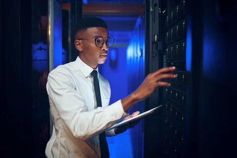 Inspection, programming and black man in server room, tablet for software d.. 写真素材