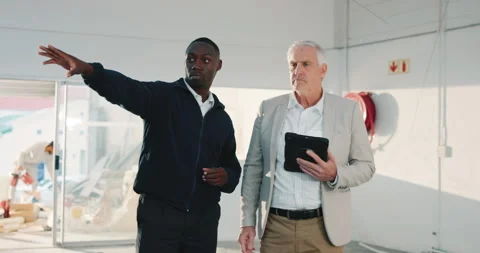 Inspection, tablet or men on site for safety, regulation feedback or review of Stock Footage 341461817