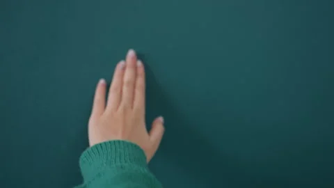 Inspector and decorator assess tiny wall mark details. Closeup captures woman Stock Footage 342054520