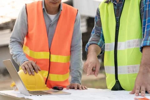 Inspector engineer and owner project is inspecting construction and quality.. Stock Photos