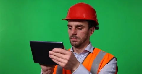Inspector Engineer Man Typing Activity on Digital Tablet Looking Away Overview Stock Footage 75859153