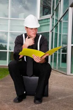 Inspector with file Stock Photos