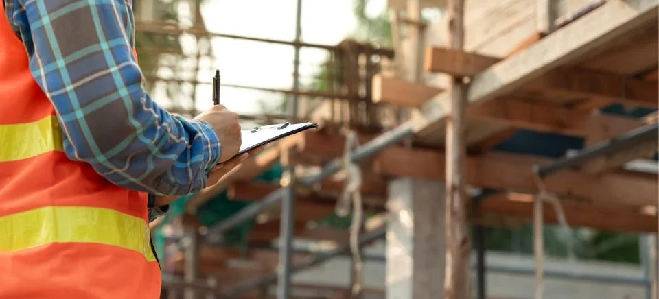 Inspector or engineer is inspecting construction and quality assurance new .. Фото