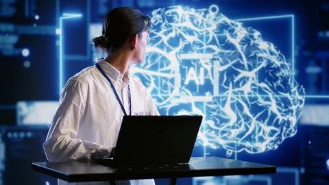 Inspector overseeing AI systems Foto stock