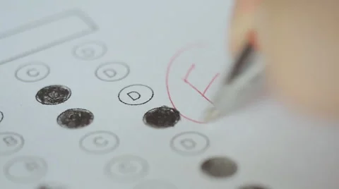 Inspector puts a a worst grade on a scantron test Stock Footage 62526274