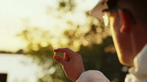 Inspector Testing Water Sample at Sunset Stock Footage 325266777