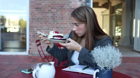 Inspector tests cake for harmful substances using an unusual device Stock Footage 345028354