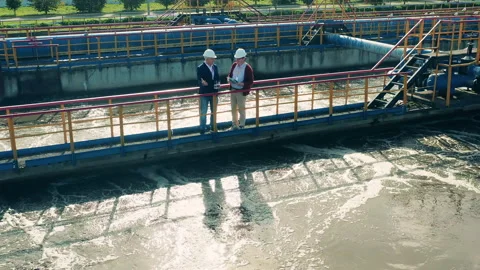 Inspectors are observing sewage waters getting cleaned Stock Footage 146509842