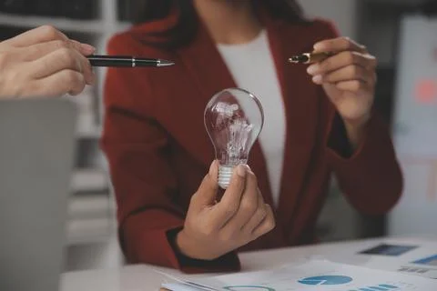 Inspiration. hand hold light bulb for good idea. brainstorming creative idea. Stock Photos