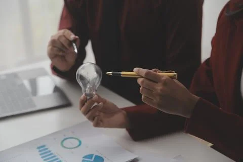 Inspiration. hand hold light bulb for good idea. brainstorming creative idea. Stock Photos