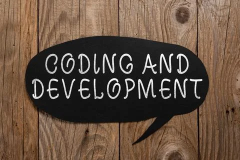 Inspiration showing sign Coding And Development. Business approach Programming Stock Photos