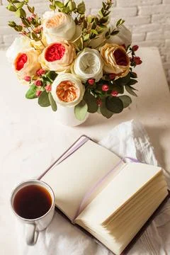 Inspiration for solving difficult problems A cup of black tea, notebook an... 写真素材
