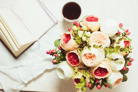 Inspiration for solving difficult problems A cup of black tea, notebook an... Stockfoto's