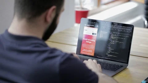 Inspiration strikes. A programmer is working on the next big thing. Innovation Stock Footage 142885370