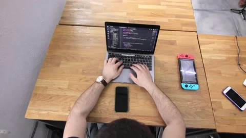 Inspiration strikes. A programmer is working on the next big thing. Innovation Stock Footage 142885444