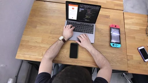 Inspiration strikes. A programmer is working on the next big thing. Innovation Stock Footage 142890276