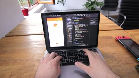 Inspiration strikes. A programmer is working on the next big thing. Innovation Stock Footage 142895195