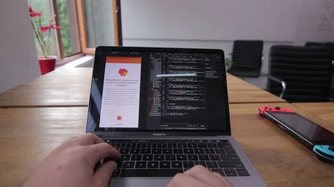 Inspiration strikes. A programmer is working on the next big thing. Innovation Stock Footage 142895909