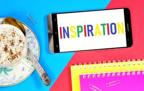 Inspiration. Text message on the smartphone screen. Stock-Fotos
