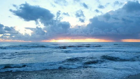 Inspirational fly over view of sunset winter stormy sea,freedom travel concept Stock Footage 146143364