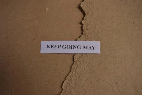 Inspirational Keep Going May typography on vintage kraft paper with copy spac 스톡 사진