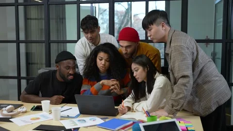 Inspired creative team during video chat at laptop Stock Footage 152344947