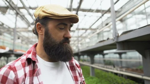 Inspired farmer smelling fresh pepper, proud of vegetable harvest, agriculture 動画素材 118962212