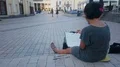 Inspired female street artist sitting on pavement and painting, art and hobby 4k or 4k+ Resolution