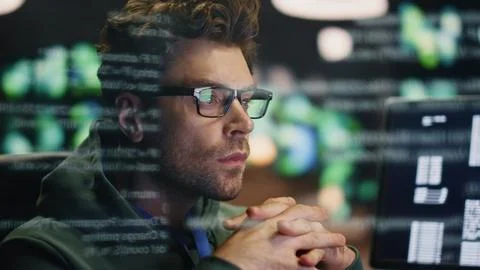 Inspired software developer working computer in room data reflection closeup Stock Photos