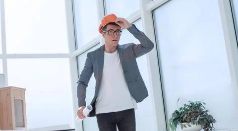Inspired young architect standing in a light room Stock Photos