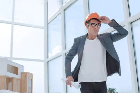 Inspired young architect standing in a light room Stock Photos