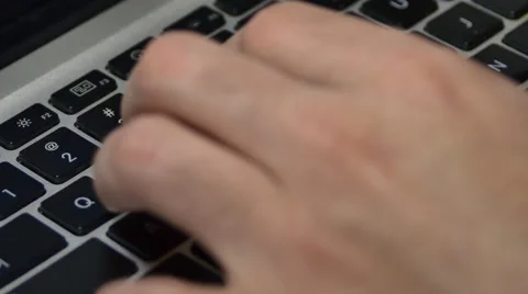Inspired Young Writer Working On His Laptop, Fingers And Keyboard Detail Video stock 64045330
