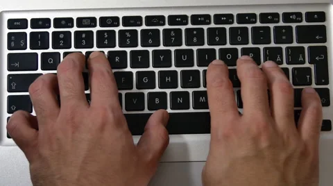 Inspired Young Writer Working On His Laptop, Hands And Keyboard Detail Stock Footage 64045343