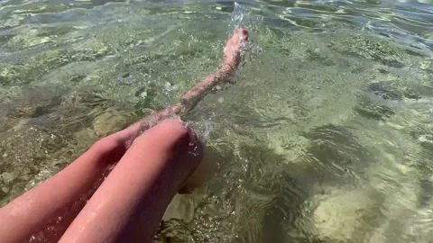 Inspiring closeup of active boy s legs doing bycicle movements while sitting on  Stock Footage 162658279
