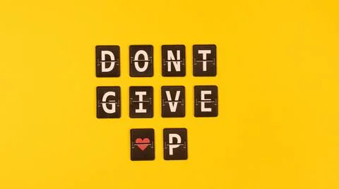 Inspiring Message Always Remember to Never Give Up, Filled With a Heart Symbol Stock Photos