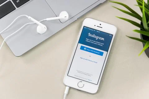 Instagram App on iPhone SE Stock Photos