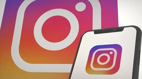 Instagram app logo in mobile display screen and background editorial Stock Footage 255171303