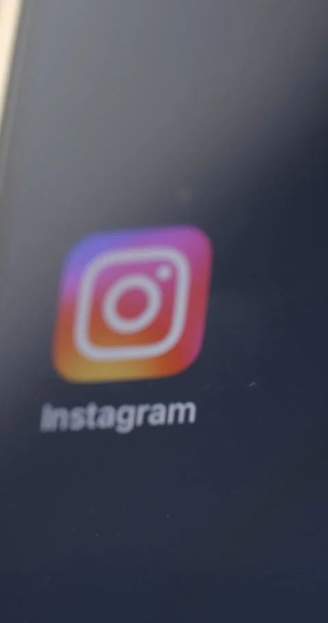 Instagram app on smartphone’s screen rotating Video stock 301256758