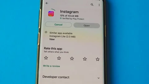 The Instagram application is installed on a smartphone. The Instagram program is Stock Footage 207404584