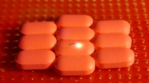 Instagram icon caption print over pill Stock Footage 118367844