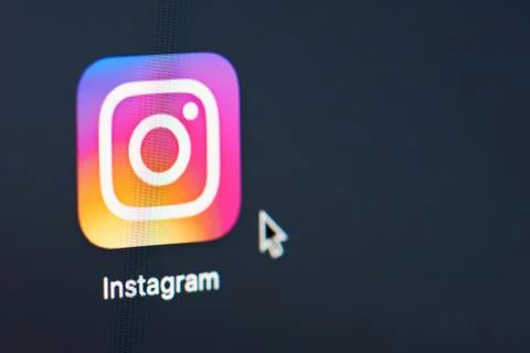 Instagram icon on screen Stock Photos