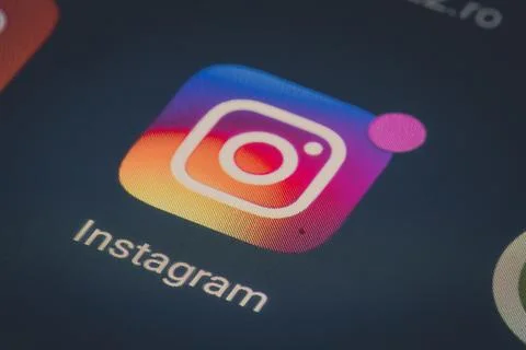 Instagram mobile app on a smartphone screen Stock Photos