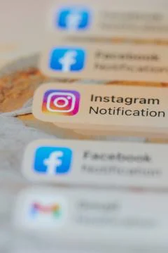 Instagram notification on smartphone Stock Photos