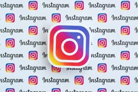 Instagram pattern printed on paper with small instagram logos and inscription Stock Photos