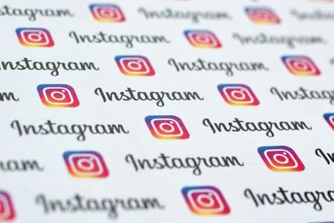 Instagram pattern printed on paper with small instagram logos and inscription Stock Photos