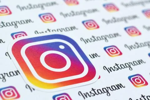 Instagram pattern printed on paper with small instagram logos and inscription Stock Photos