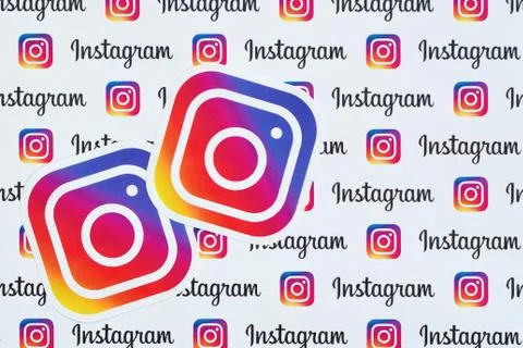 Instagram pattern printed on paper with small instagram logos and inscription Stock Photos